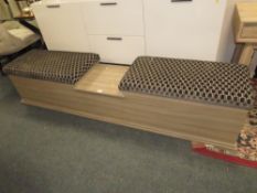 A LARGE UPHOLSTERED BENCH TYPE SEAT L-216 CM