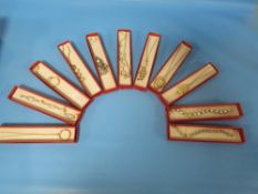 A SELECTION OF SEVEN ASSORTED BOXED PENDANTS