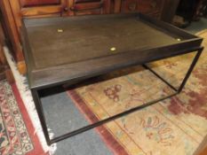 A MODERN RECTANGULAR COFFEE TABLE
