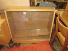 A MID CENTURY OAK GLAZED BOOKCASE AND A LAMKIN RUG (2)