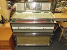 A 1960S WURLITZER AMERICANA 3100 JUKEBOX - 80 PLAYS ON 7