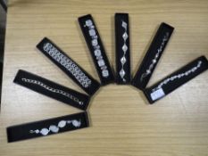 A SELECTION OF ELEVEN ASSORTED BOXED BRACELETS