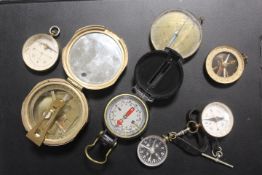 A COLLECTION OF VINTAGE COMPASSES