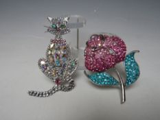 TWO LARGE BUTLER & WILSON BROOCHES COMPRISING A SEATED CAT WITH RETICULATED TAIL H 14 cm & A PINK