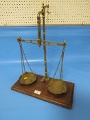 A SET OF VINTAGE BRASS SCALES