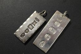 TWO HALLMARKED SILVER INGOT TYPE PENDANTS