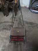 A VINTAGE PUSH LAWN MOWER