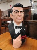 A MODERN RESIN JAMES BOND BUST H-55 CM