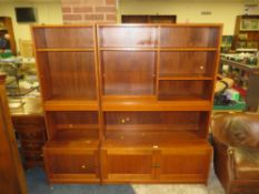 A MID-CENTURY TEAK BOOKCASE H-170 CM W-179 CM