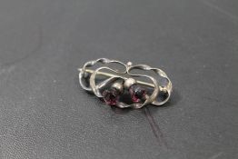 AN ANTIQUE HALLMARKED CHESTER SILVER BROOCH BY CHARLES HORNER