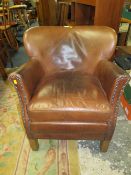 A REPRODUCTION CLUB STYLE ARMCHAIR