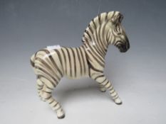 A BESWICK MODEL OF A ZEBRA