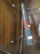 AN ANTIQUE FOUR CHAMBER TABLE TOP TELESCOPE ON FOLD OUT STAND