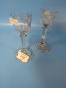 TWO MID 18TH CENTURY CORDIAL DRINKING GLASS, EACH ENGRAVED TO THE BOWLS WITH HOHO BIRDS ROSEBUDS AND