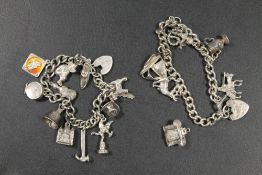 TWO SILVER CHARM BRACELETS
