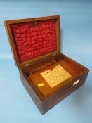 AN ANTIQUE INLAID WRITING SLOPE DATED 6TH MAY 1889