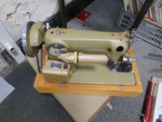 A CASED VINTAGE ALFA SEWING MACHINE