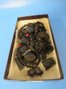 A BOX OF VICTORIAN AND LATER JEWELLERY INCLUDING JET