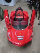 A RIDE ALONG CHILDS BATTERY FERRARI CAR WITH REMOTE - NO CHARGER