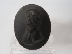 A WEDGWOOD STYLE BASALT PORTRAIT PLAQUE - JOSIAH WEDGWOOD