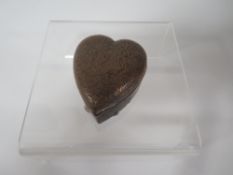 A HALLMARKED SILVER HEART SHAPED PILL BOX