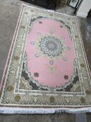 A MODERN EASTERN SILK RUG WITH PINK COLOUR X CM