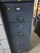 A FOUR DRAWER FILING CABINET