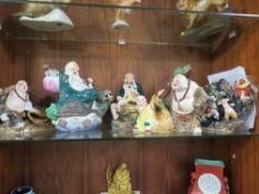 A COLLECTION OF FIVE ASSORTED LARGE ORIENTAL PORCELAIN FIGURES, each dressed in traditional dress,