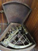 A BRASS SEXTANT IN AN HARDWOOD CASE