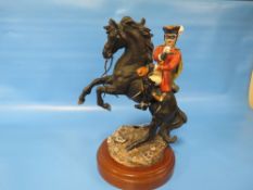 A ROYAL DOULTON 'DICK TURPIN' HN 3272, limited edition No. 1208 / 5000, raised on a wooden