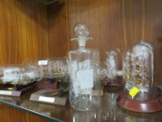 EIGHT ASSORTED SHIPS/CARS IN BOTTLES ETC