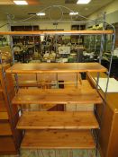 A MODERN PINE OPEN FOLDING BOOKCASE