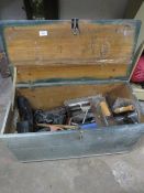 A WOODEN TRAVEL BOX AND TOOLS