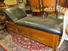 A MID CENTURY ADJUSTABLE TREATMENT COUCH WITH THREE DRAWERS BELOW