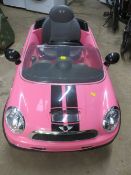 A RIDE ALONG BATTERY CHILDS PINK MINI CAR - NO CHARGER