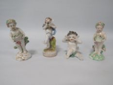 FOUR ANTIQUE CONTINENTAL PORCELAIN CHERUB FIGURES