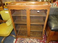 A MAHOGANY GLAZED TWO DOOR BOOKCASE A/F