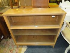 AN OAK UTILITY STYLE GLAZED BOOKCASE