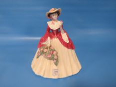 A LARGE HOLLY BRIGHT COALPORT FIGURINE - AS FOUND