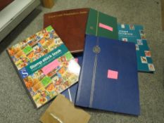 A BAG OF STAMPS TO INCLUDE THREE PART FILLED STOCK BOOKS, TWO SMALL STOCK BOOKS - CANADA / GERMANY A
