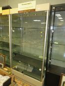 A MODERN TWO DOOR LIGHT-UP DISPLAY CABINET WITH KEYS 198 X 100 CM