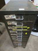 A VINTAGE 12 DRAWER STEEL FILING STORAGE CABINET