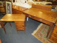 A VINTAGE OAK TWO DRAWER OFFICE DESK, W-122 CM AND A SMALLER OAK DESK A/F (2)