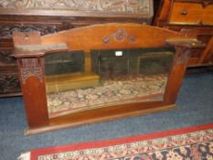 AN OAK ART NOUVEAU MIRROR