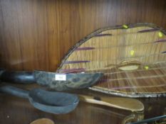 AN EAST AFRICAN UGANDA GANDA WICKER SHIELD WITH HANDLE, a large Zulu porridge spoon, a West