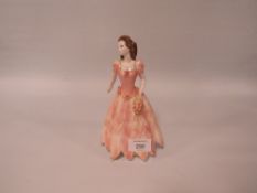A COALPORT FIGURINE 