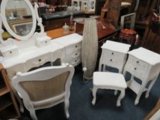 A QUANTITY OF WHITE FURNITURE TO INC DRESSING TABLE, MIRROR, ARMCHAIR, THREE CHESTS, STOOL AND LAMP