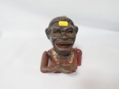 A VINTAGE MONEY BANK