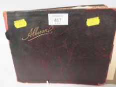 A VINTAGE SKETCH BOOK CONTAINING WATER COLOURS, PEN AND INKS AND PENCIL SKETCHES ETC