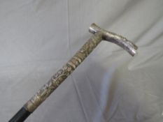 A LATE 19TH / EARLY 20TH CENTURY WALKING STICK, with white metal ornate handle, L 81 cm